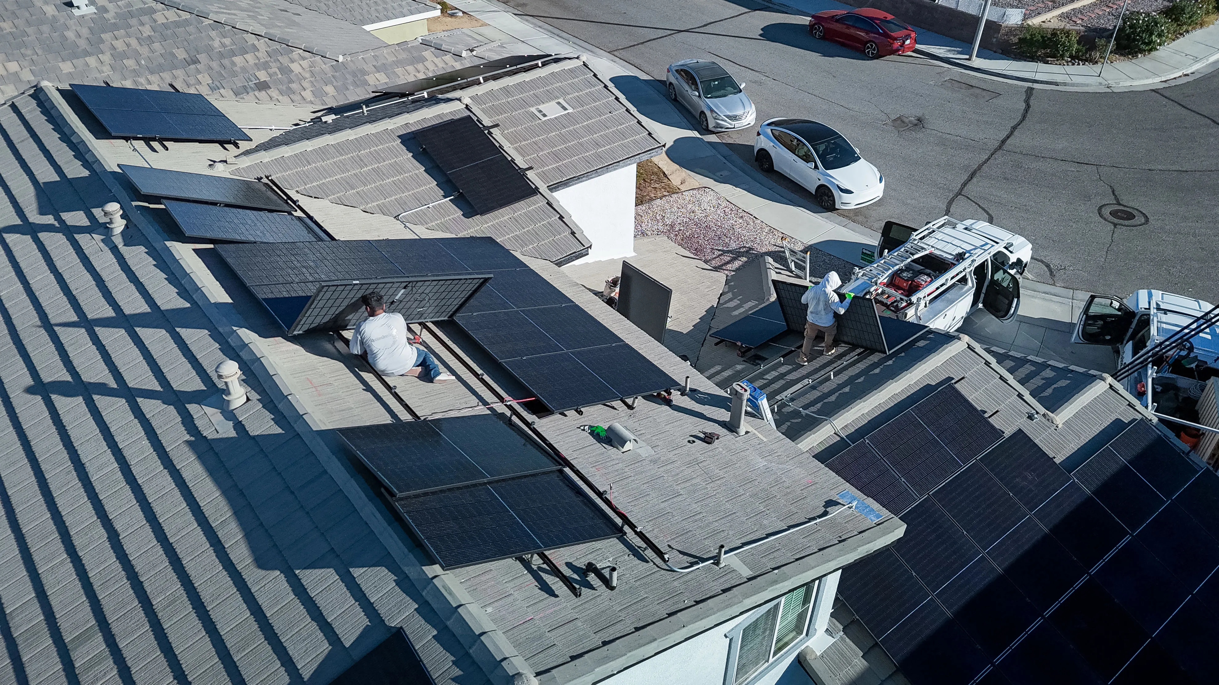 Option One Solar install crew on a residential rooftop